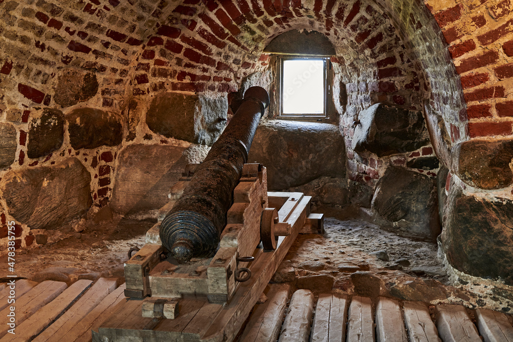 Russia. Solovki. Solovetsky Monastery. Cannon at the slit window of the defensive tower