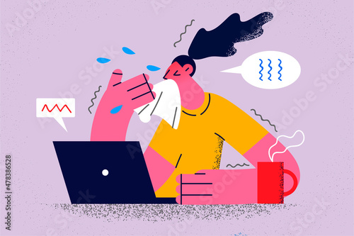 Sick woman work on computer having cold 