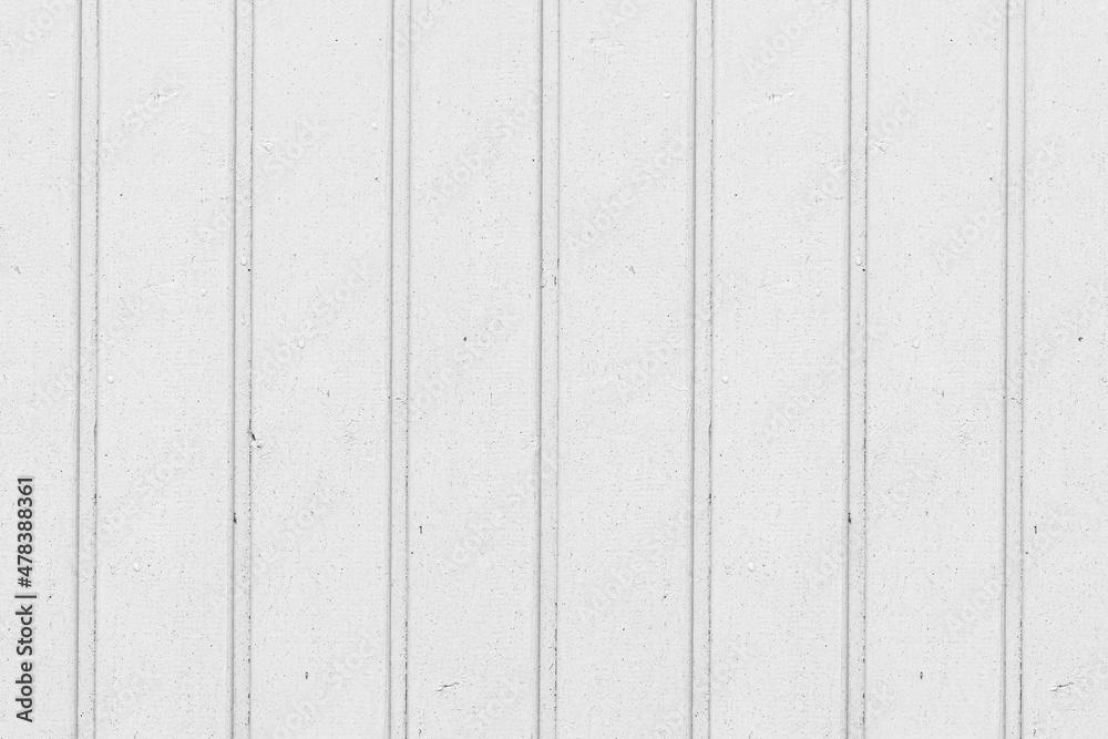A texture of white vertical boards with knots A texture of white vertical boards with knots