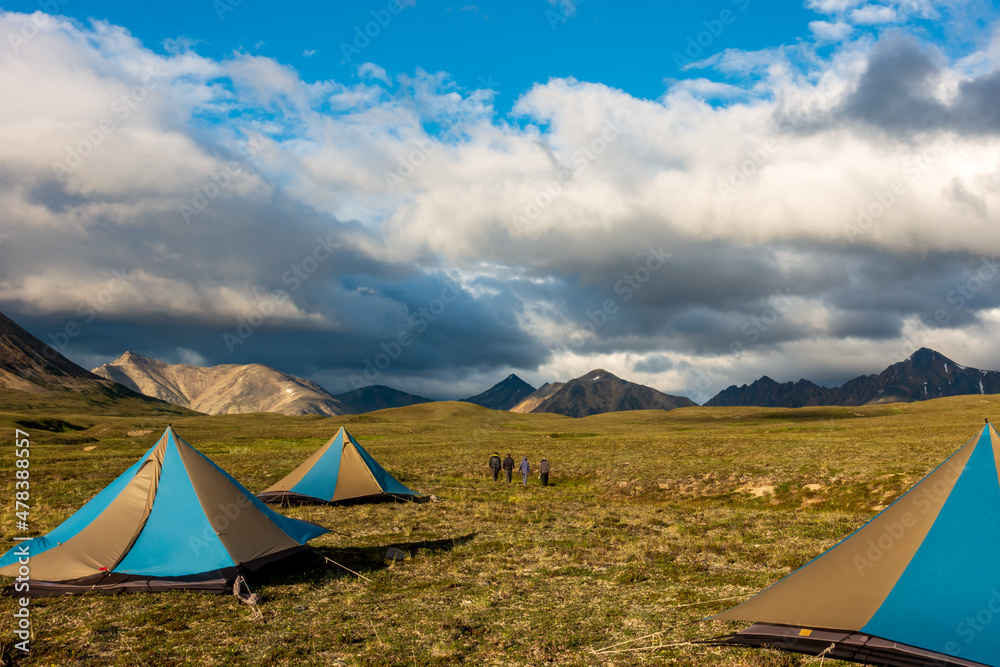 Light weight tarp tents pitched  on an alpine plateau high in the Northern Talkeetna Mountains of Alaska.