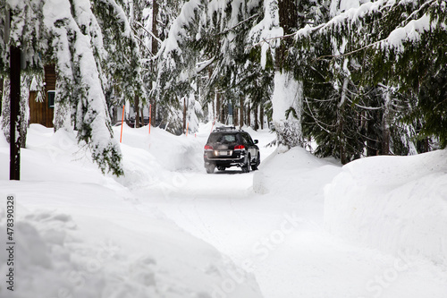 Car on Snowy Road