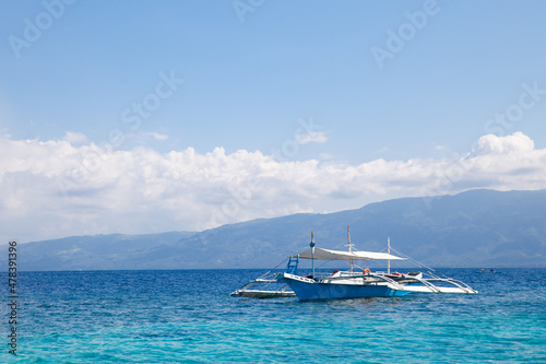 beautiful turquoise ocean water with boat. boat at sea. Beautiful seascape. © Tatiana Nurieva