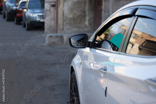 white car mirror close up © Vahagn