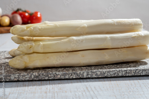 New harvest of high quality Dutch white asparagus washed, uncooked