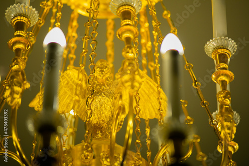 Detailed view of antique chandelier, photographed from underneath. High quality photo