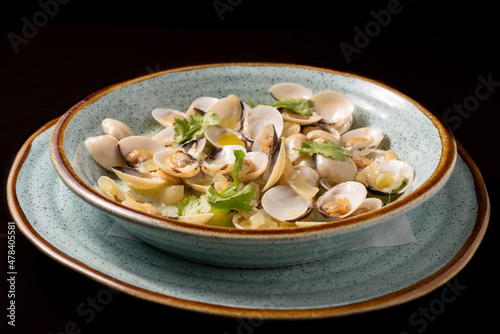 clams "à Bulhão Pato", a traditional dish of Portuguese cuisine - selective focus.