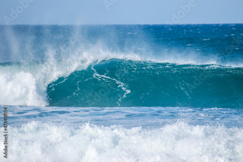 Perfect wave breaking in a beach. Surf spot