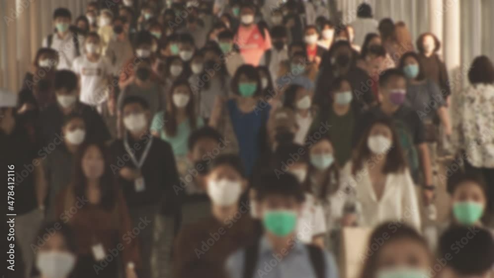 Defocused, Large crowd of business people with medical face mask. Air pollution. Coronavirus, covid 19 quarantine, 