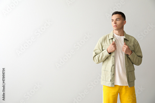 Young man in stylish jacket...