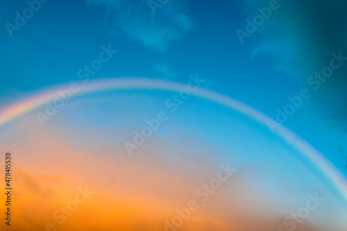 View the sky with rainbow in rural area of Guatemala, open space at sunset.