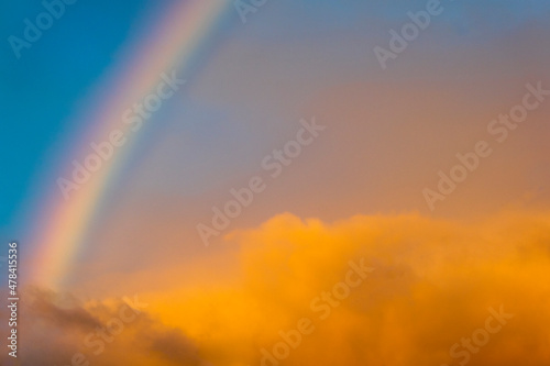 View the sky with rainbow in rural area of Guatemala, open space at sunset. © Byron Ortiz