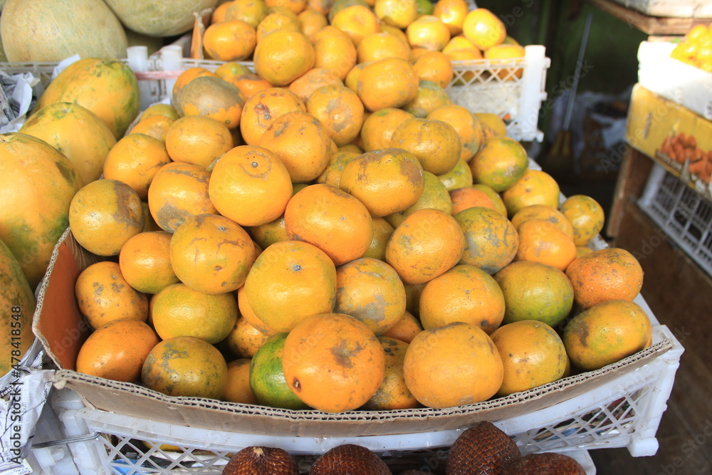 Close-up of Local Oranges at Indonesian Traditional Market