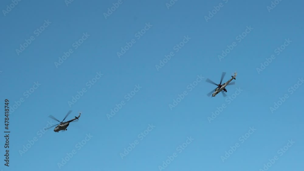 Two Helicopters Flying In Sky, Aerobaltic, Gdynia, Poland Two Helicopters Flying In Sky, Aerobaltic, Gdynia, Poland