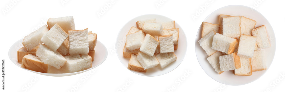 Slices toast bread in dish on white background