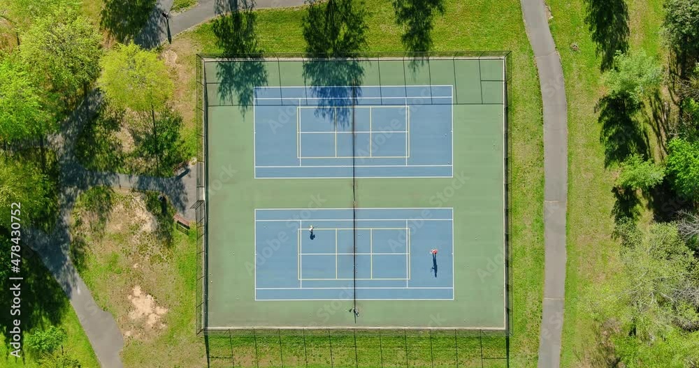 Tennis playing field a high point shot height of autumn trees beautiful landscape