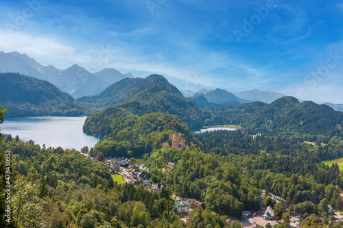 View to the village Hohenschwangau with Alpsee lake and Schwansee lake and the Allgaeu alps, Bavaria, Germany