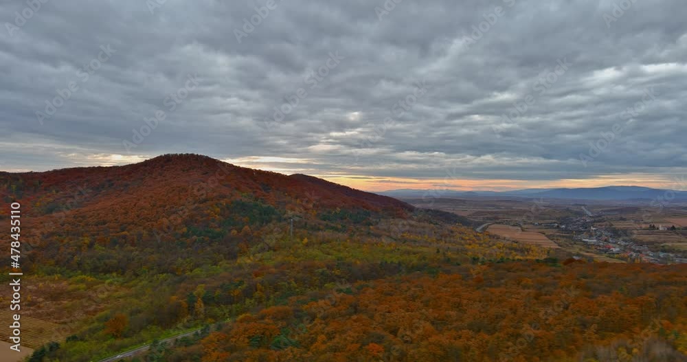Aerial view of panoramic beautiful idyllic nature landscape with mountain scenery autumn forest and meadow