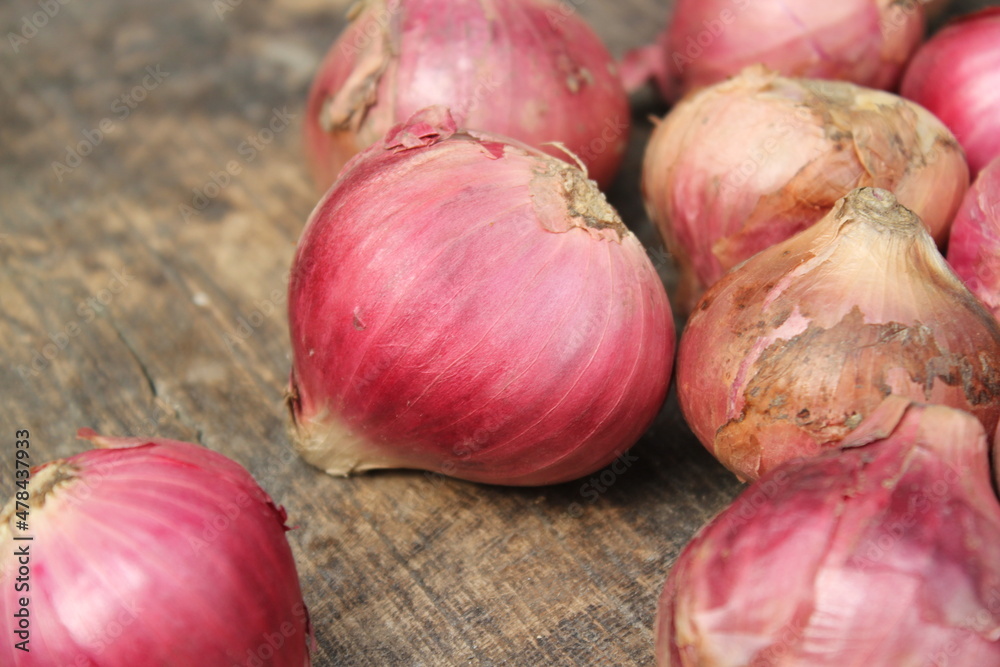 Closeup shot of a bunch of red onions Closeup shot of a bunch of red onions