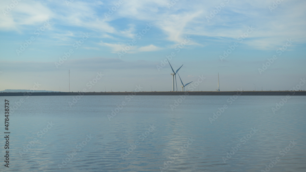 Fototapeta premium background of wind turbines at sunset..