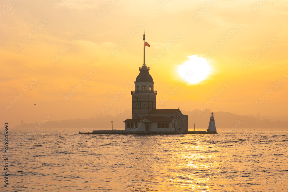 Istanbul background photo. Maiden's Tower at sunset with foggy weather.