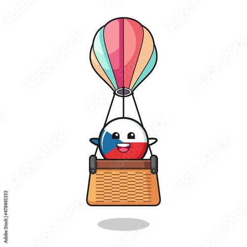 czech flag mascot riding a hot air balloon