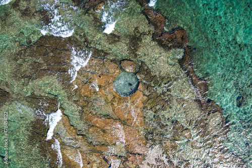 A natural pool is hewn in a natural rock near the shoreline of Haifa, Israel. photo