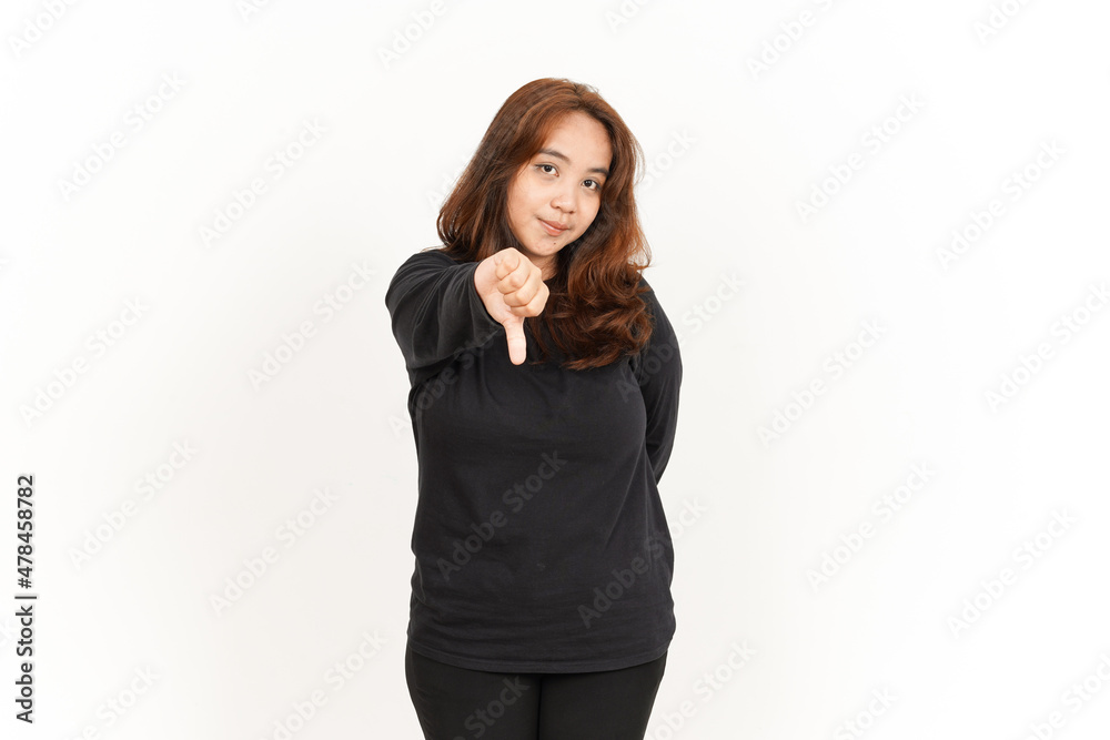 Showing Thumbs Down Of Beautiful Asian Woman Wearing Black Shirt Isolated On White Background Showing Thumbs Down Of Beautiful Asian Woman Wearing Black Shirt Isolated On White Background