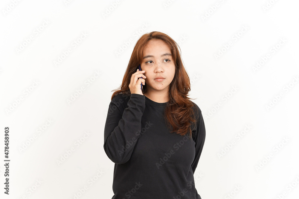 Talking on Smartphone Of Beautiful Asian Woman Wearing Black Shirt Isolated On White Background Talking on Smartphone Of Beautiful Asian Woman Wearing Black Shirt Isolated On White Background