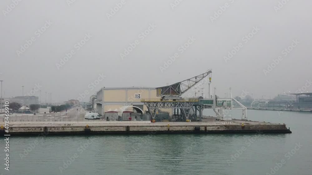Venice, Italy - January 2022 - Traveling on the ferry that transports cars, along the Giudecca canal, among the splendid historic buildings of the lagoon city Venice, Italy - January 2022 - Traveling on the ferry that transports cars, along the Giudecca canal, among the splendid historic buildings of the lagoon city