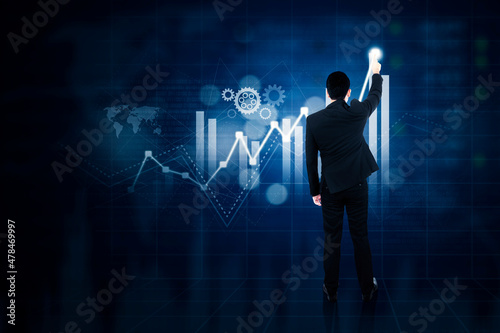 Male manager touching increasing finance graph