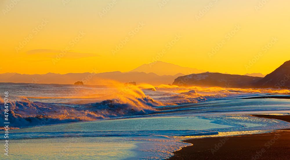 Colorful sunrise in the Pacific Ocean in Kamchatka peninsula Colorful sunrise in the Pacific Ocean in Kamchatka peninsula