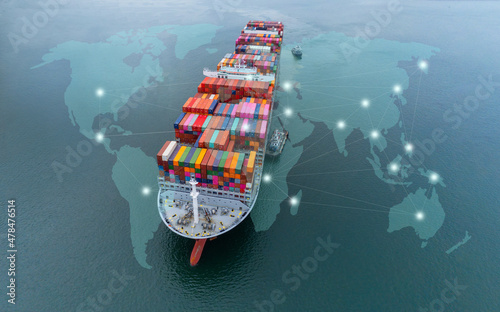 Aerial top view containers ship cargo business commercial logistic and transportation international import export by container freight cargo ship in the open seaport show ocean network on map photo