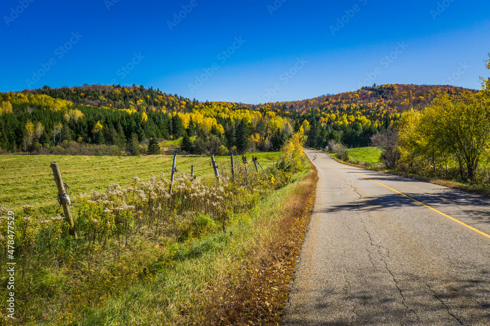 View on the countryside, the hills and the fall foliage from hiking trails in Val Notre Dame Abbey in Lanaudiere, a region of Quebec, Canada
