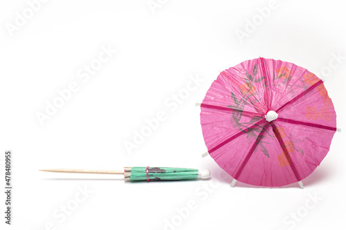 Closeup party paper umbrella white background