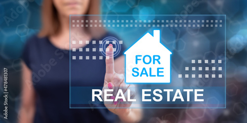 Woman touching a real estate concept