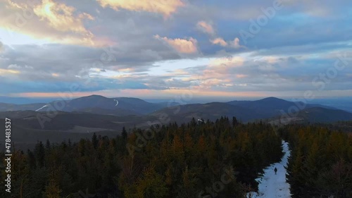 Cinematic beatifull and smooth fly above autumn winter forest - timelaspe, hypelapse, single person.