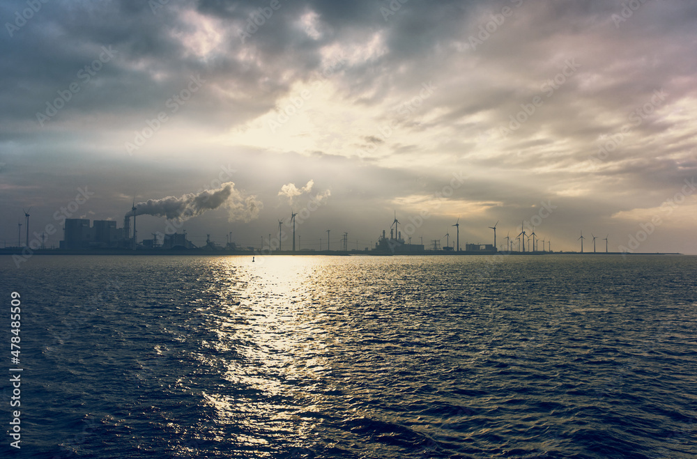 Naklejka premium Wind turbine, the sky and the sea