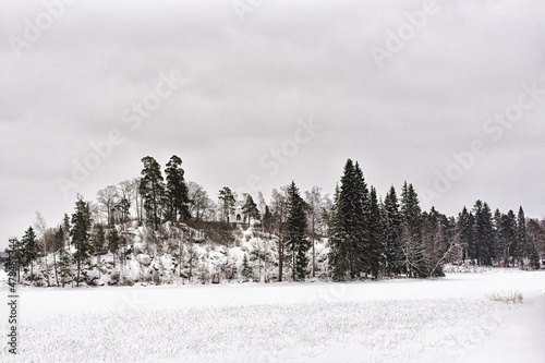 Park Mon Repos or Monrepos in a snowy forest in Vyborg in winter