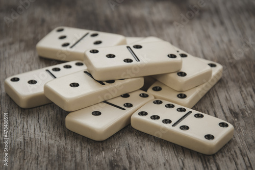 Dice and dominoes on wooden table  casino luck