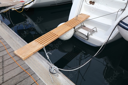Wooden gangway to a boat