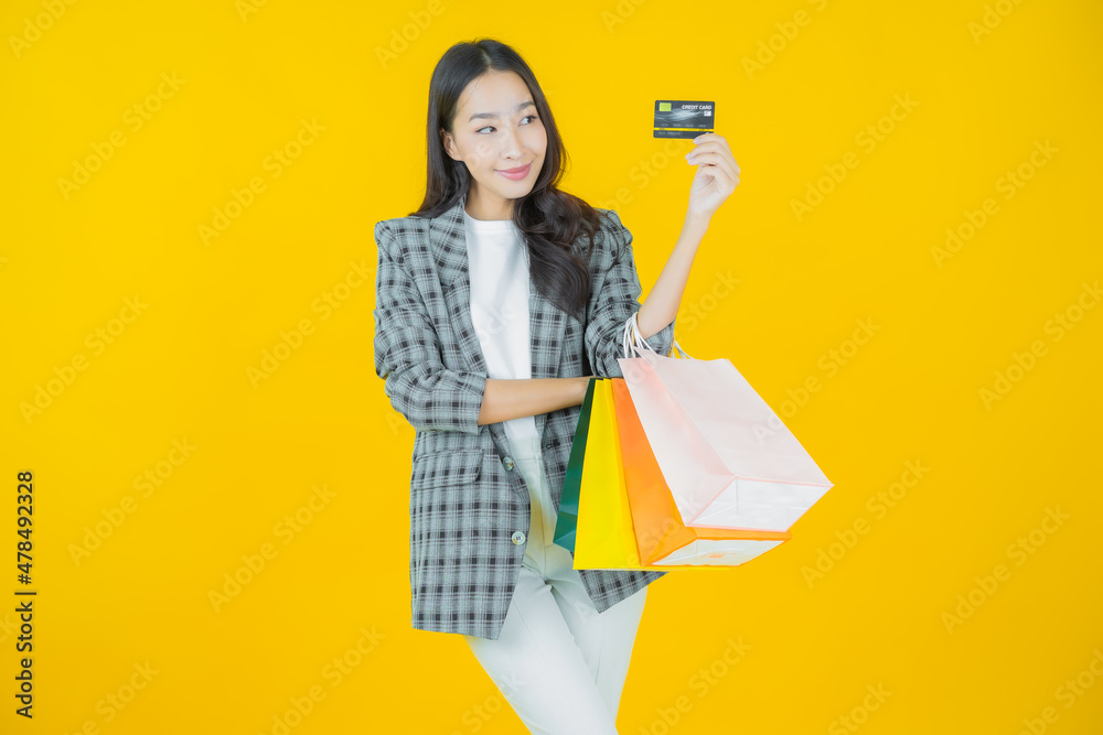 Portrait beautiful young asian woman smile with shopping bag Portrait beautiful young asian woman smile with shopping bag
