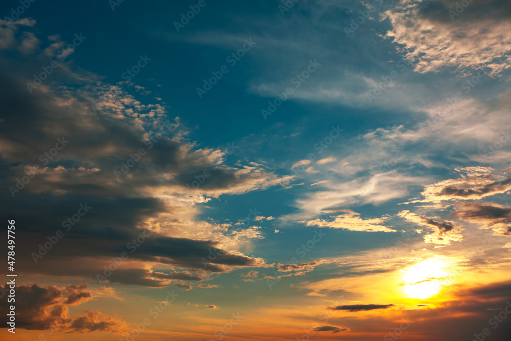 Fototapeta premium Twilight with clouds and sun . Spectacular sky in the evening 