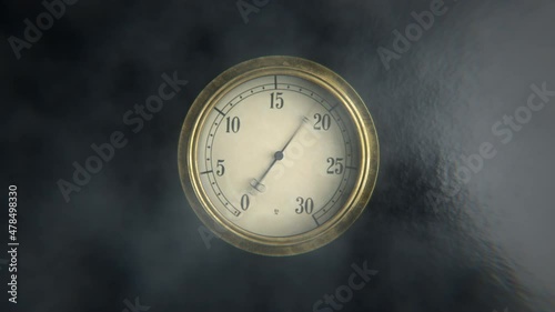 Vintage manometer or thermometer gauge under high steam pressure or temperature