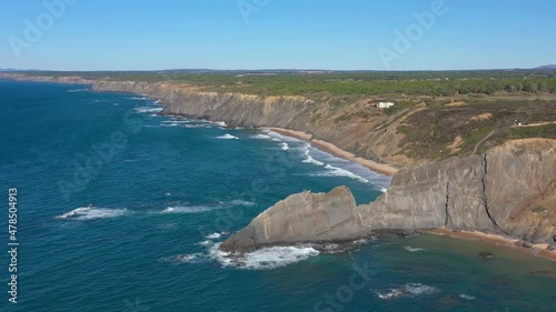 Aerial view of the Portuguese mountain coastline, Vicentina. Aljezur village, beach Vale dos Homens. Sagres