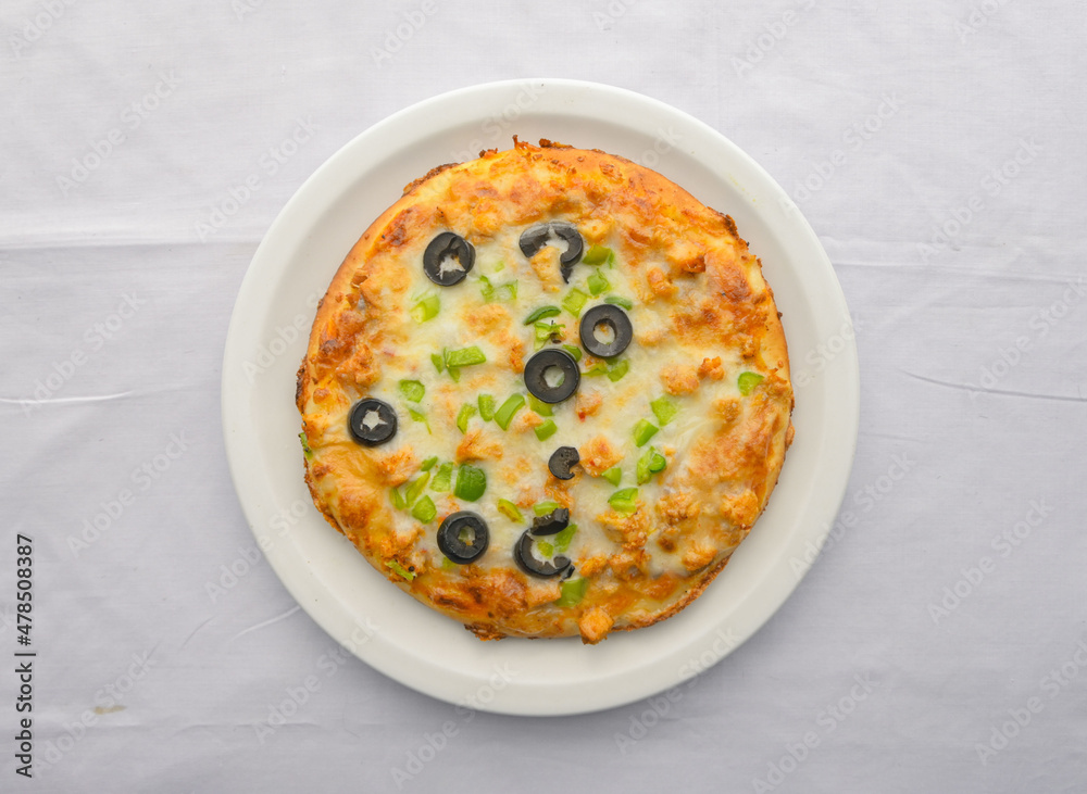 Chicken Fajita Pizza isolated on wooden background, spiced chicken cubes and cheese combination on bread, Italian food top view Chicken Fajita Pizza isolated on wooden background, spiced chicken cubes and cheese combination on bread, Italian food top view