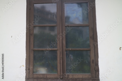 glass window with wooden frame