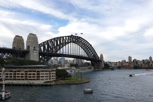 The Sydney Harbour Bridge is a steel through arch bridge across Sydney Harbour that carries traffic between the Sydney CBD and the North Shore. © ltyuan