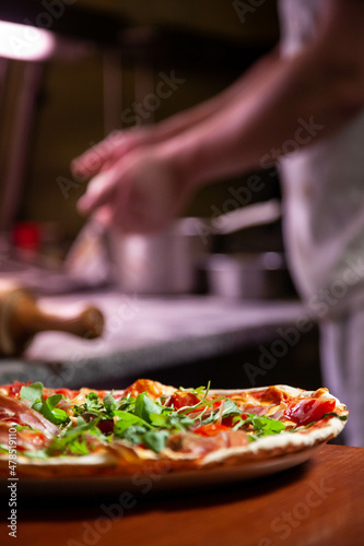 Chef, pizza chef prepares pizza for customers. preparation