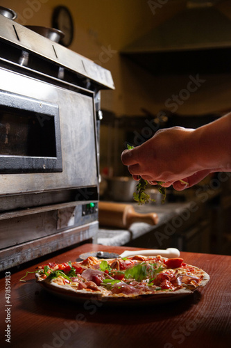Chef, pizza chef prepares pizza for customers. preparation