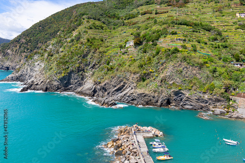 Aerial view on bay with moored boats in the marina, Vernazza, Italy